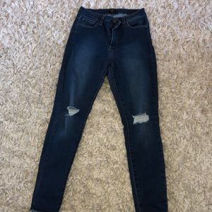 High waisted distressed jeans